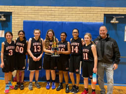 Quest Girls Basketball Goes Undefeated to Win Tournament